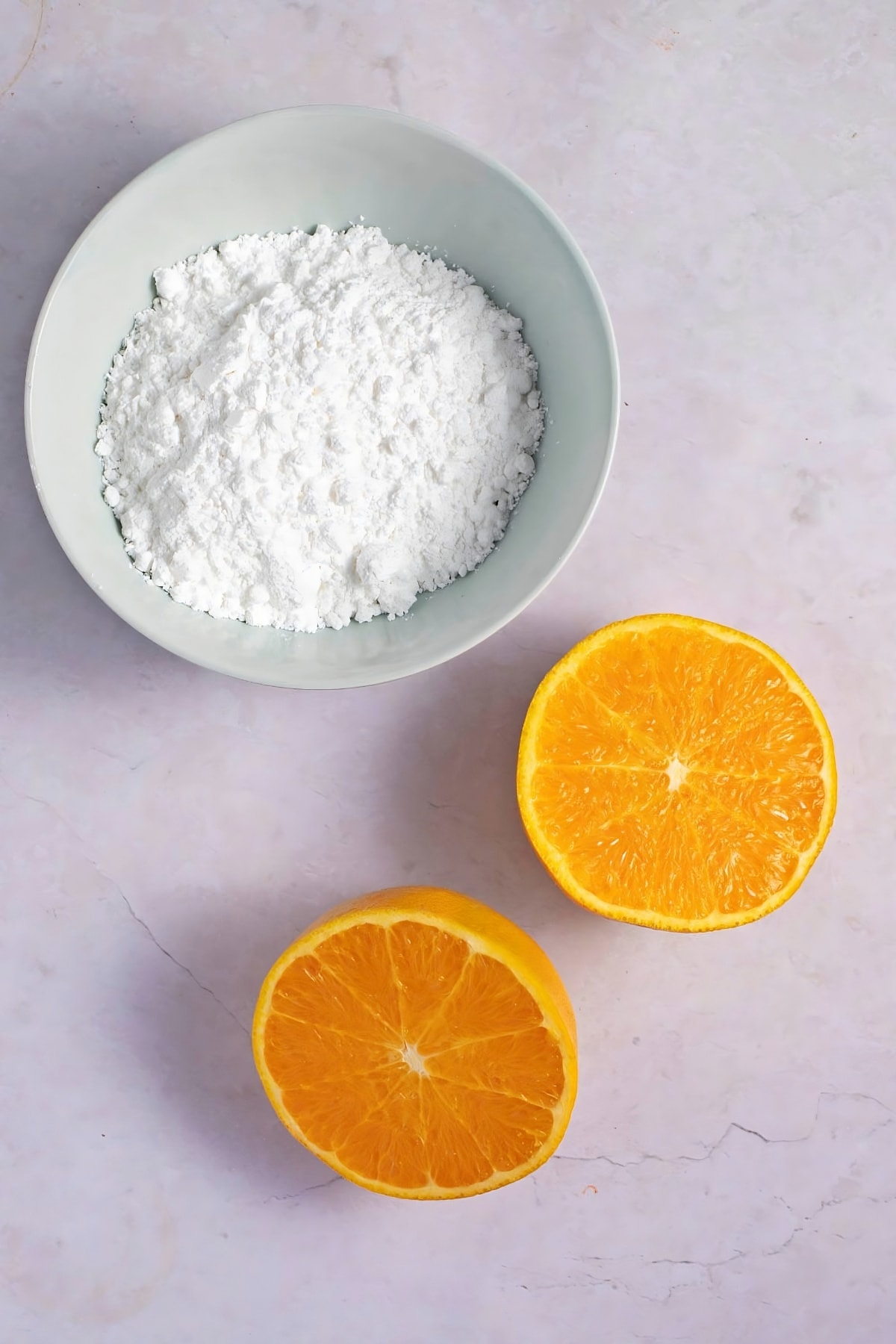 Orange Glaze Icing Ingredients - Confectioner's Sugar and Oranges
