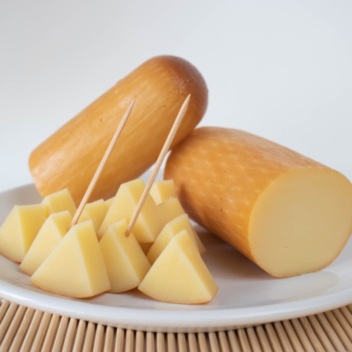 Provolone Cheese Rounds and Triangles on a Plate