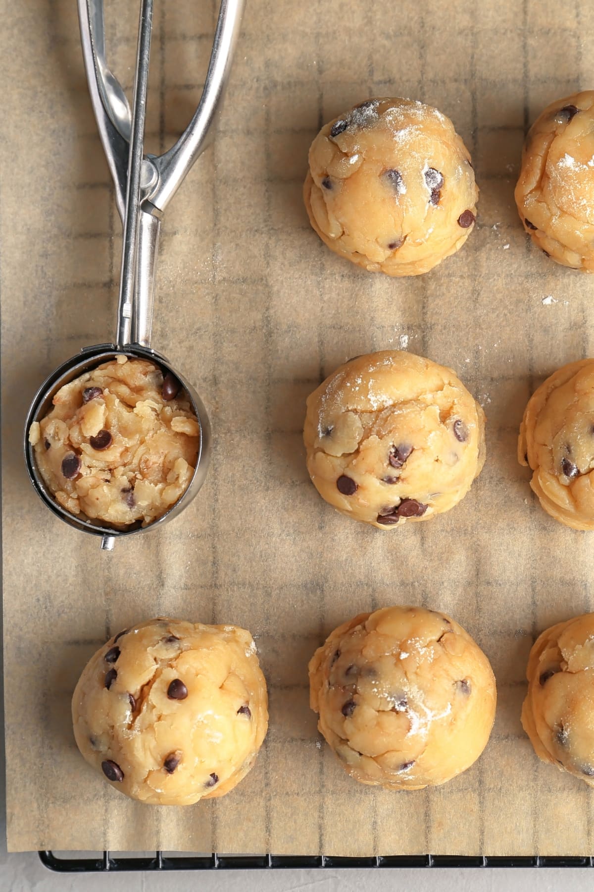 Raw Cookie Dough With Chocolate Chips on a Parchment Paper