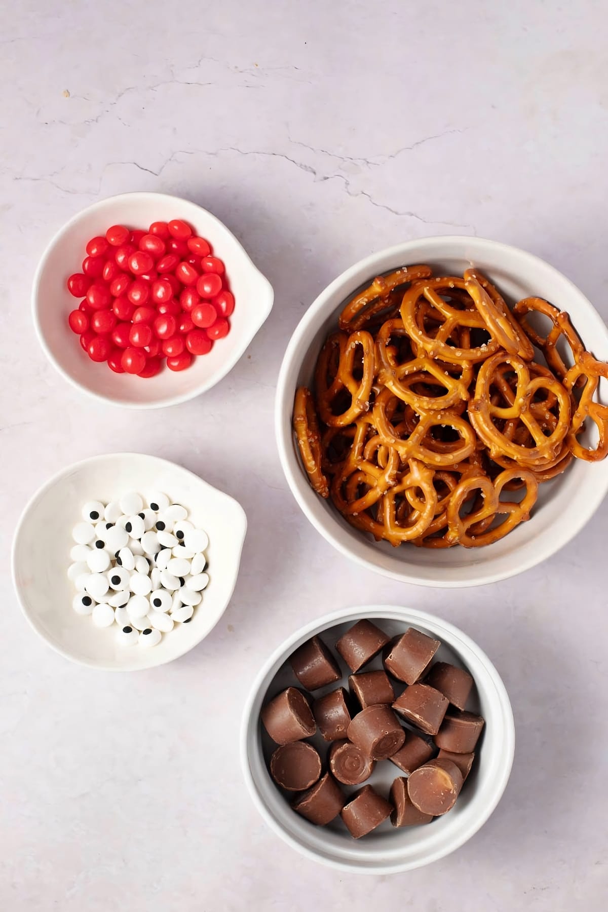 Reindeer Pretzel Ingredients - ROLOs, Small Pretzel Twists, Candy Eyes and Small Round Red Candies
