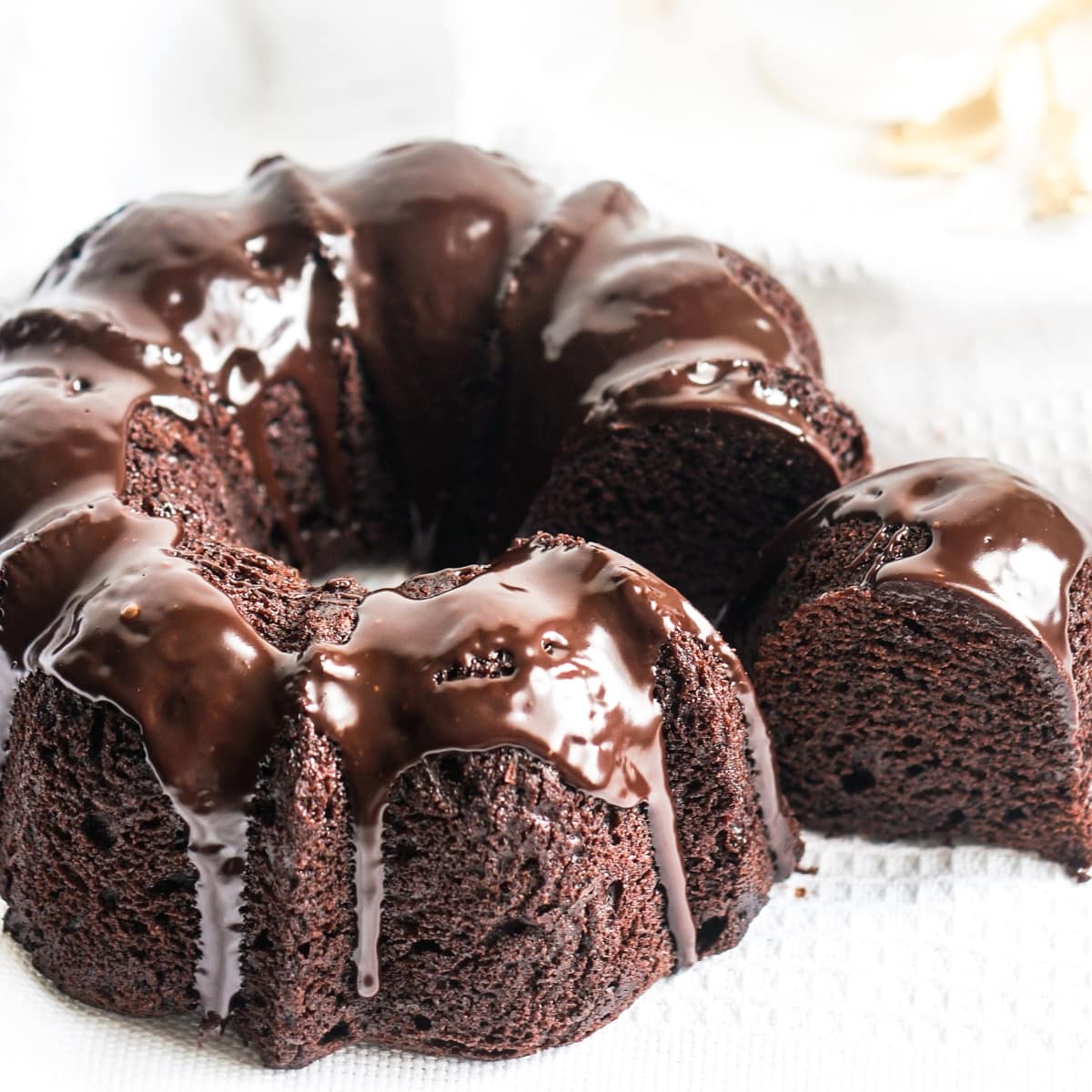 Chocolate Pound Cake with Chocolate Ganache and a Slice Removed