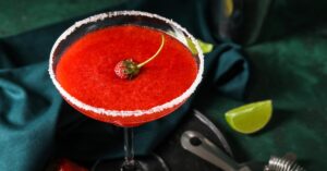 A Glass of Homemade Strawberry Daiquiri with Lime and Salt