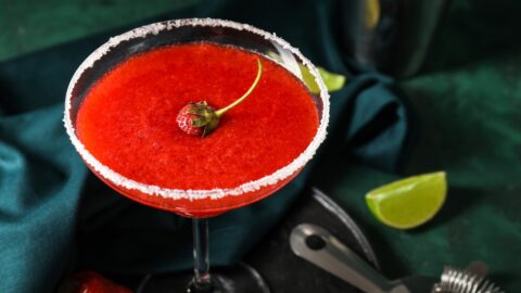 A Glass of Homemade Strawberry Daiquiri with Lime and Salt