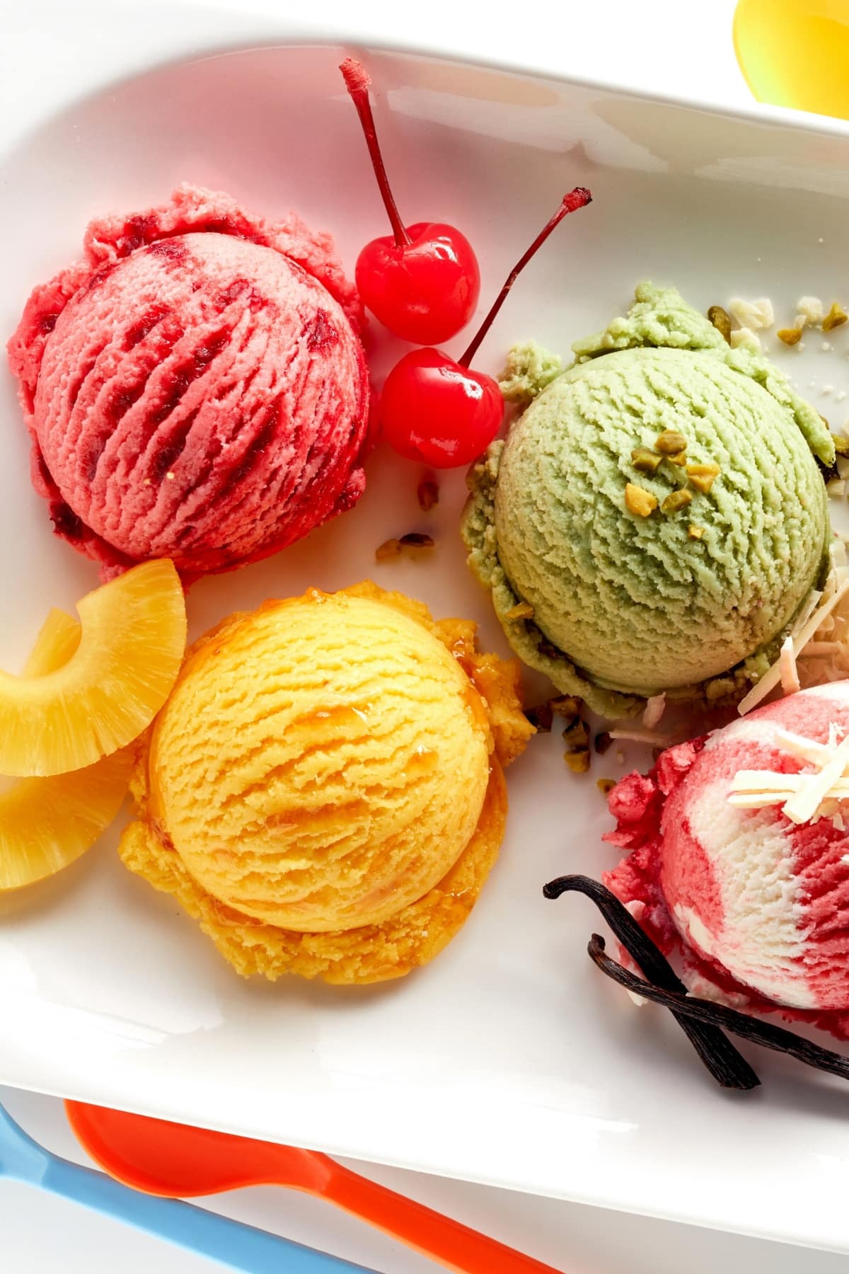 Sweet Cold Ice Cream Flavors with Pistachio, Pineapple and Cherry