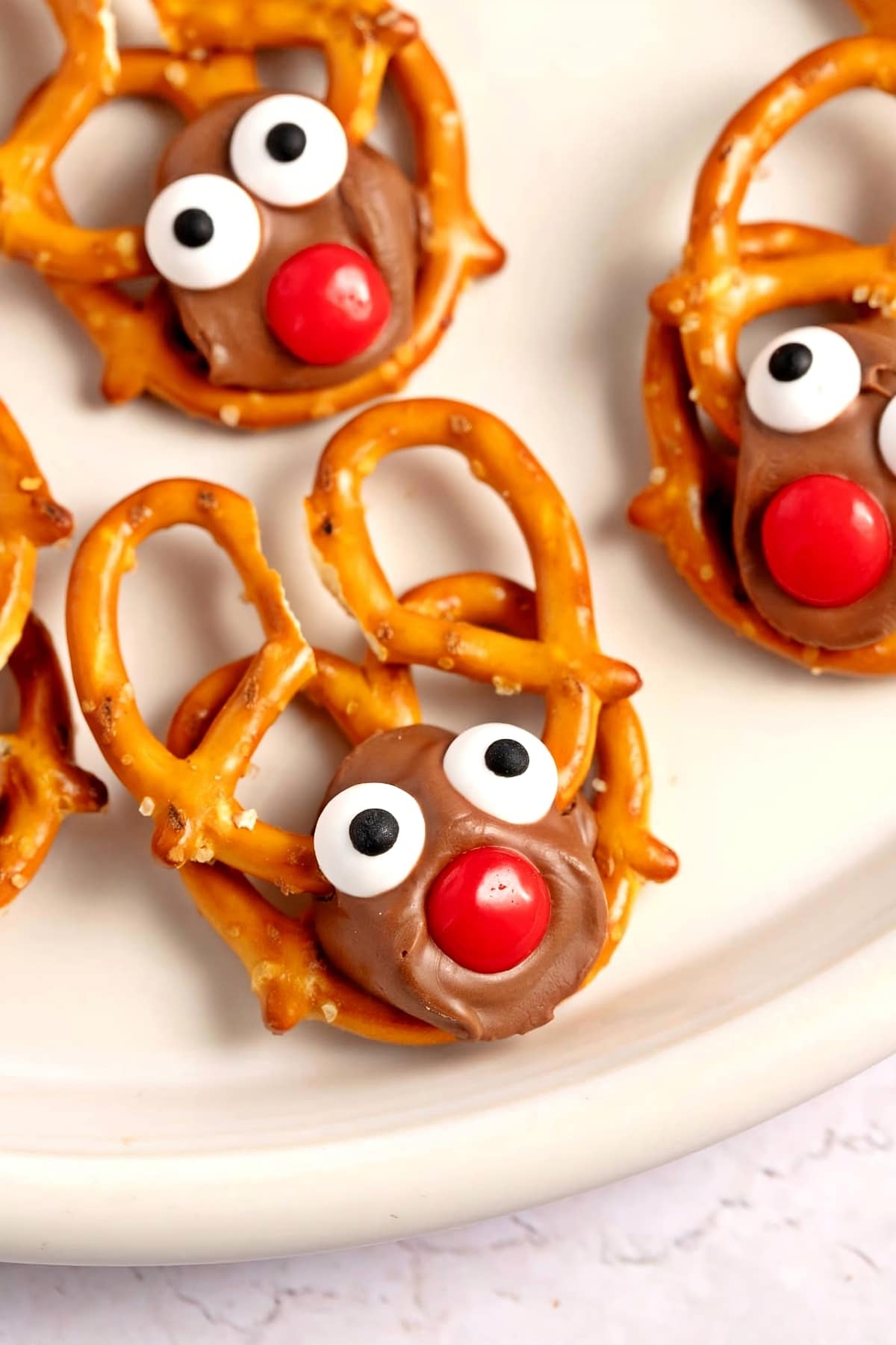 Sweet Homemade Reindeer Pretzels with Eye Candies and Red Candy Noses