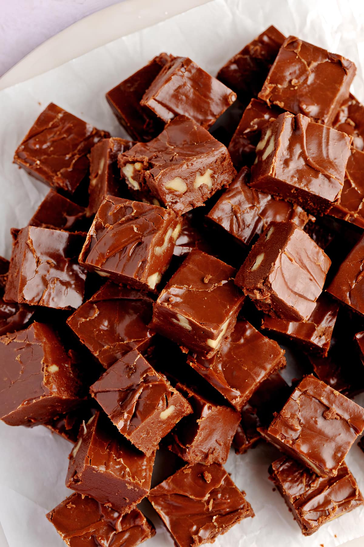 A Pile Pieces of Fudge on a White Surface