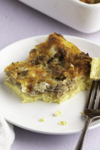 A Slice of Cheesy Homemade Crescent Roll Casserole with Sausage and Egg