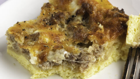 A Slice of Cheesy Homemade Crescent Roll Casserole with Sausage and Egg