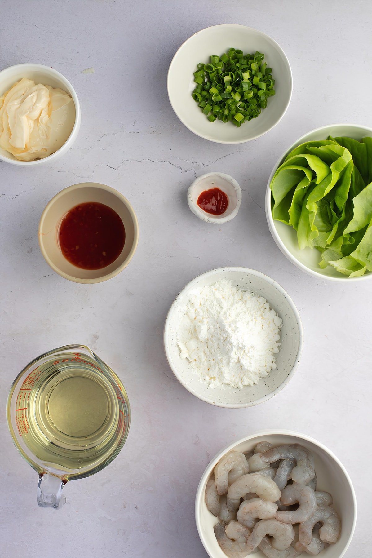 Bang Bang Shrimp Ingredients - Sweet Chili, Sriracha, Cornstarch, Shrimp, Oil, Lettuce Leaves and Green Onions