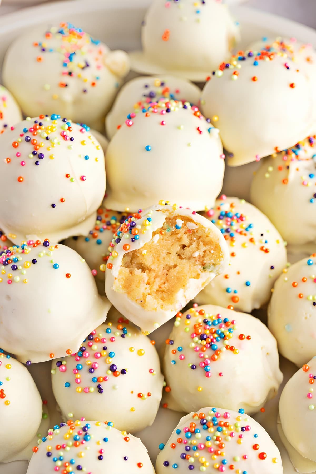 Bite Sized Cake Balls Covered in White Chocolate Shell
