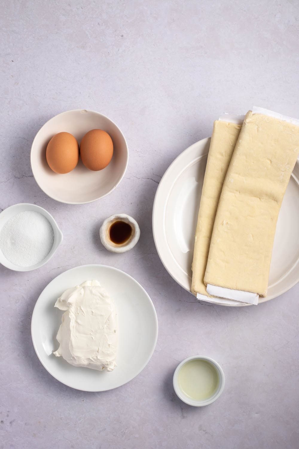 Cheese Danish Ingredients: eggs, sugar, cream cheese, vanilla, and puff pastry 