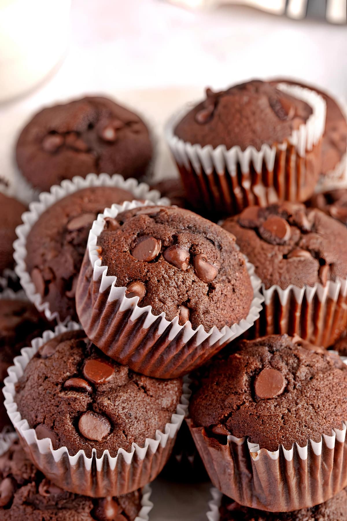 Bunch of Chocolate Muffins with Chocolate Chips on Top
