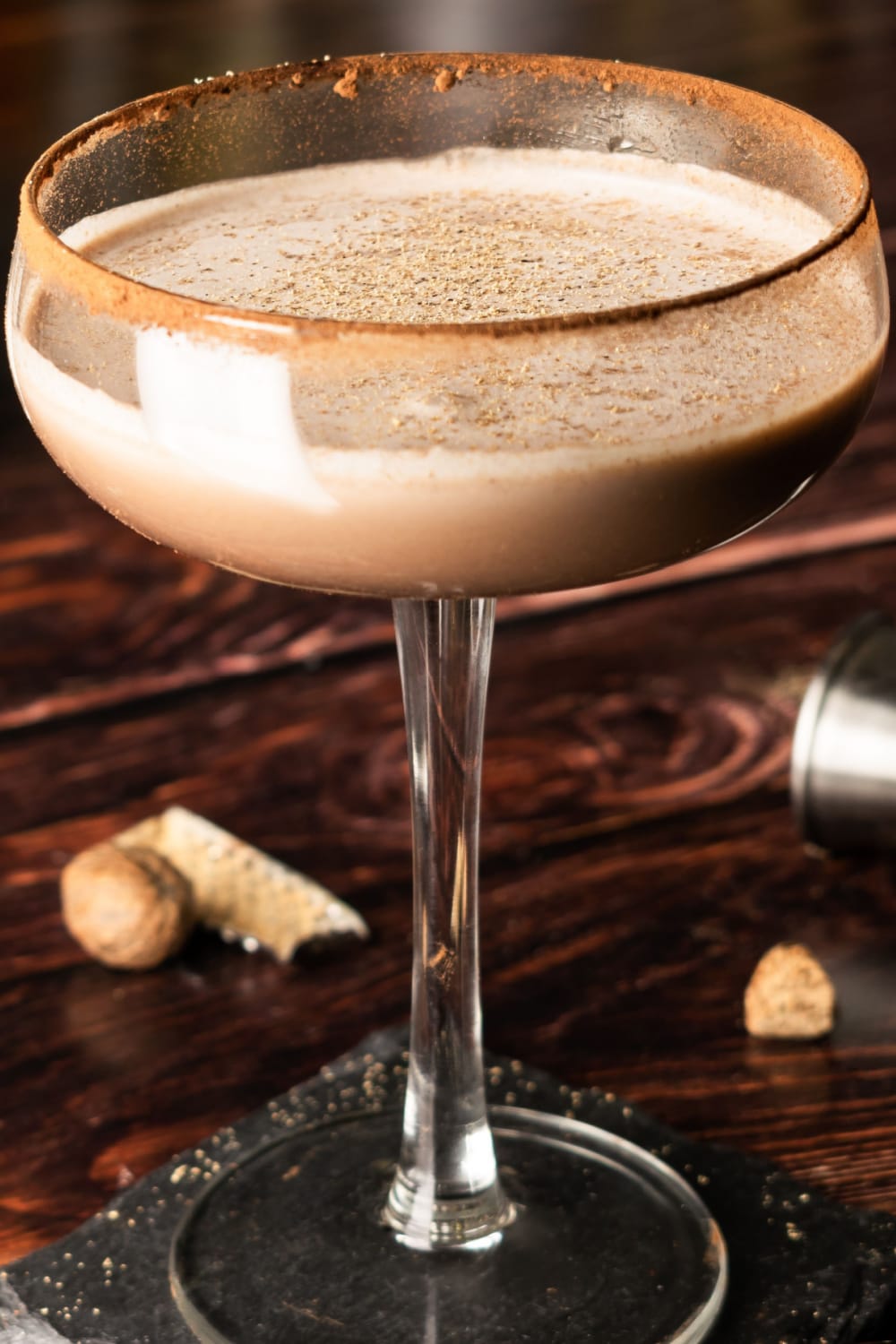 Coupe of Brandy Alexander on a Varnished Table