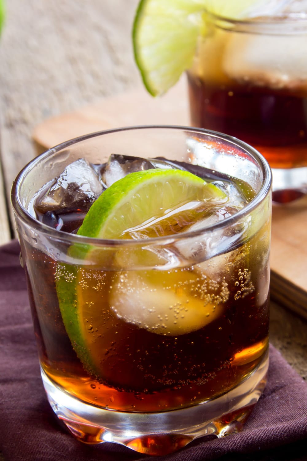Cuba Libre on the Rocks Garnished with Lime Slice