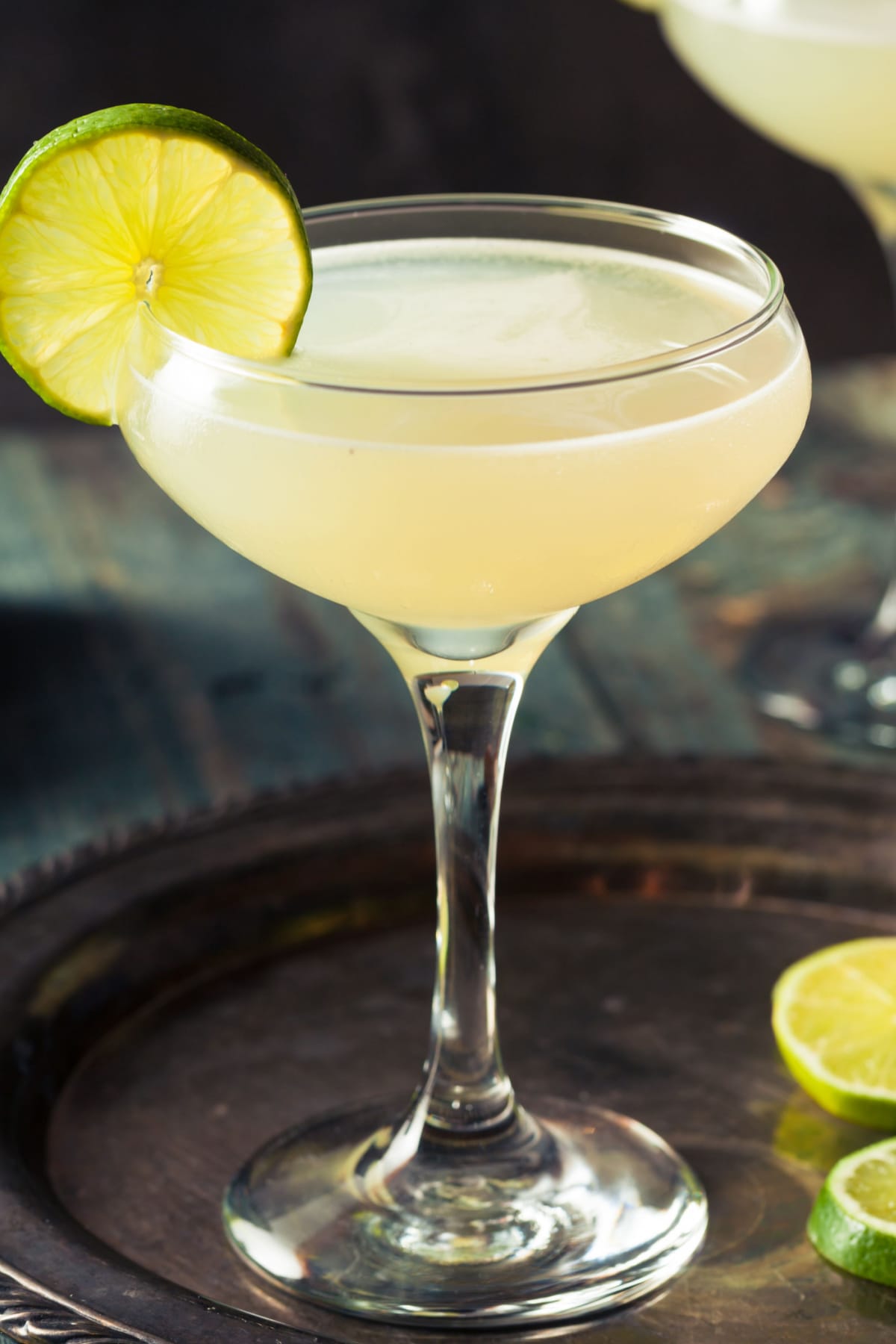 Classic Daiquiri Cocktail (Easy Recipe) featuring Daiquiri Cocktail Garnished With Lime Wheel