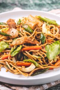 Homemade Filipino Flour Noodles or Pancit with Pork and Vegetables
