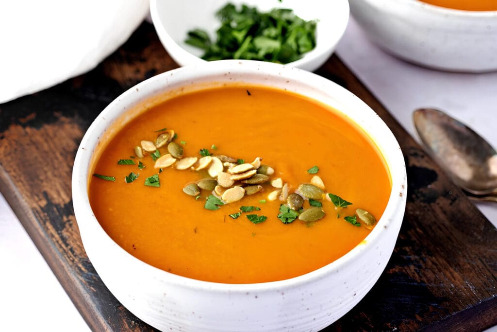 Homemade Pumpkin Soup with Thyme, Parsley and Seeds