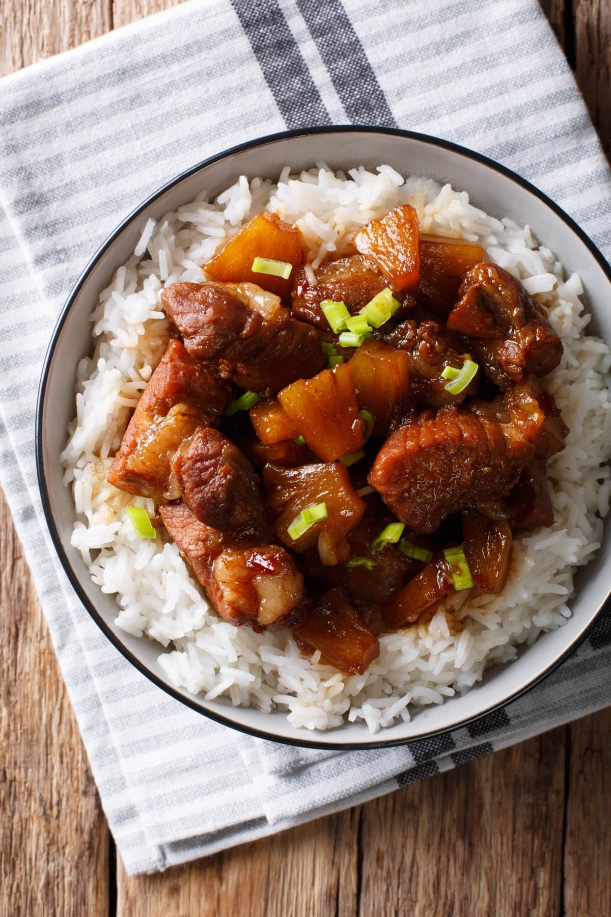 13 Best Filipino Pork Recipes (Easy Meals) featuring Homemade Spicy Pork Hamonado with Pineapple, Rice and Green Onions
