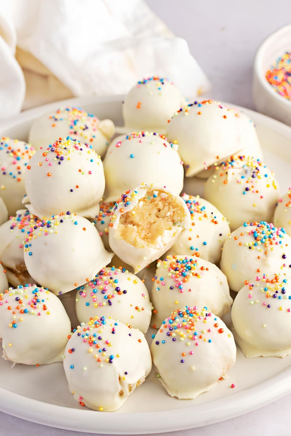 Plate Full of Cake Balls with Sprinkle Toppings