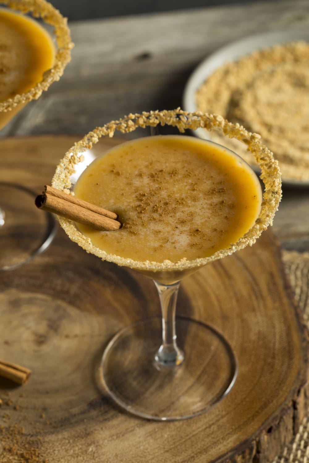 Pumpkin Martini and Crushed Graham Crackers on Wooden Table
