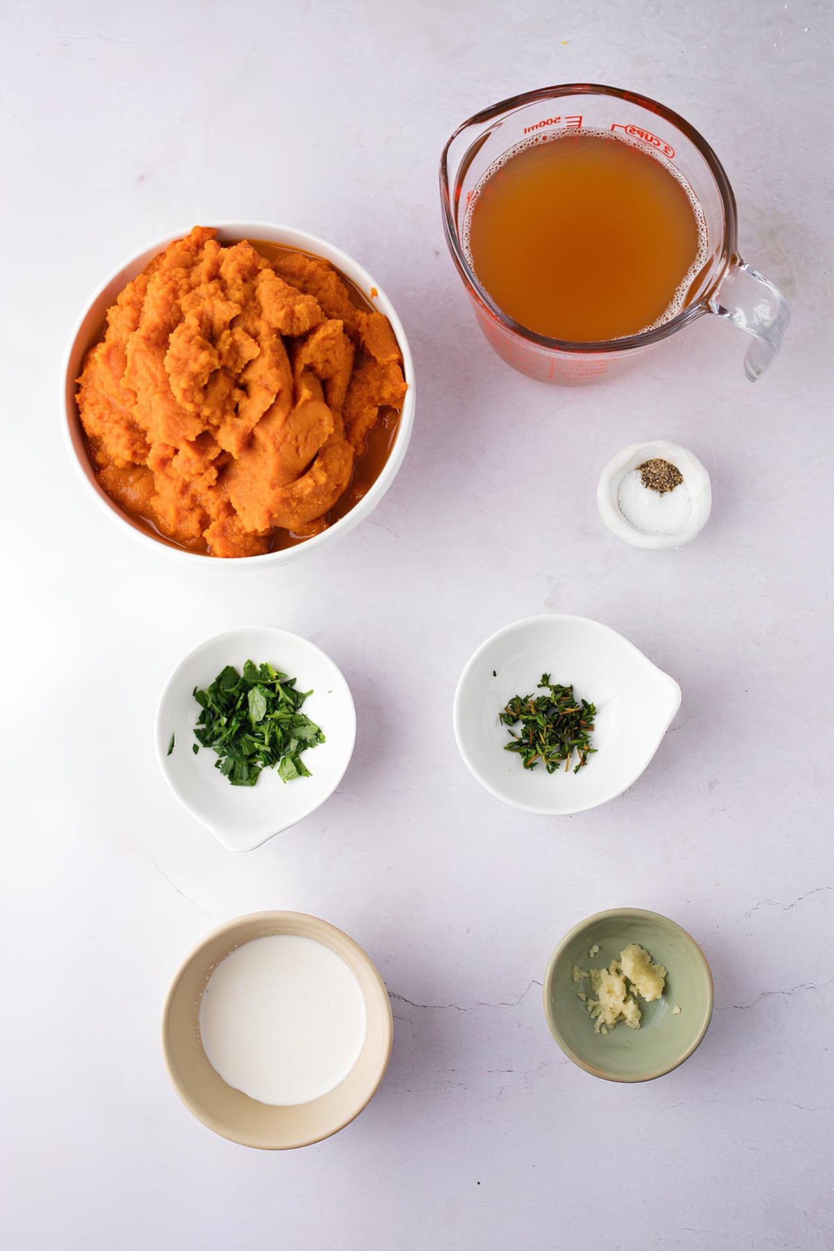 Pumpkin Soup Ingredients - Chicken Stock, Pumpkin Puree,  Salt, Parsley, Onion, Garlic, Thyme, Whipping Cream and Ground Pepper