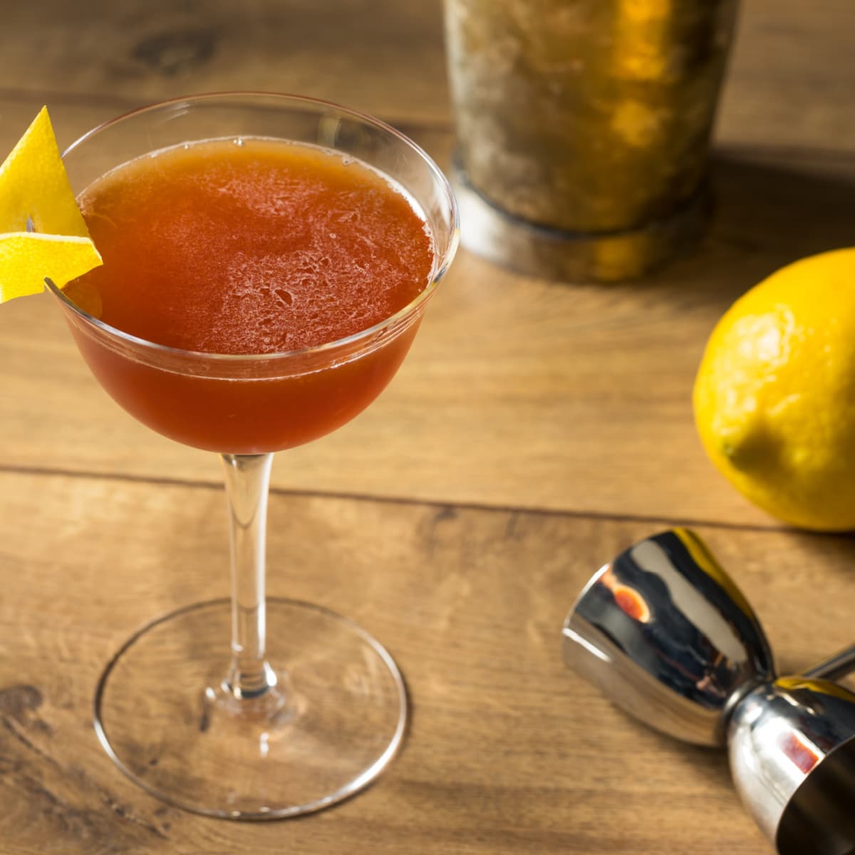 Paper Plane Cocktail on a Wooden Table
