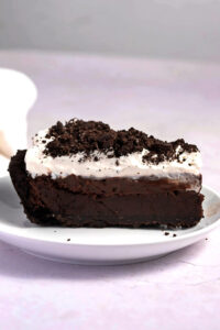 Slice of Homemade Mississippi Mud Pie with Oreo Crumbs