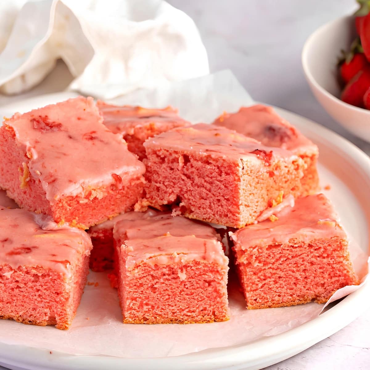 Slices of Strawberry Brownies on a Round Plate