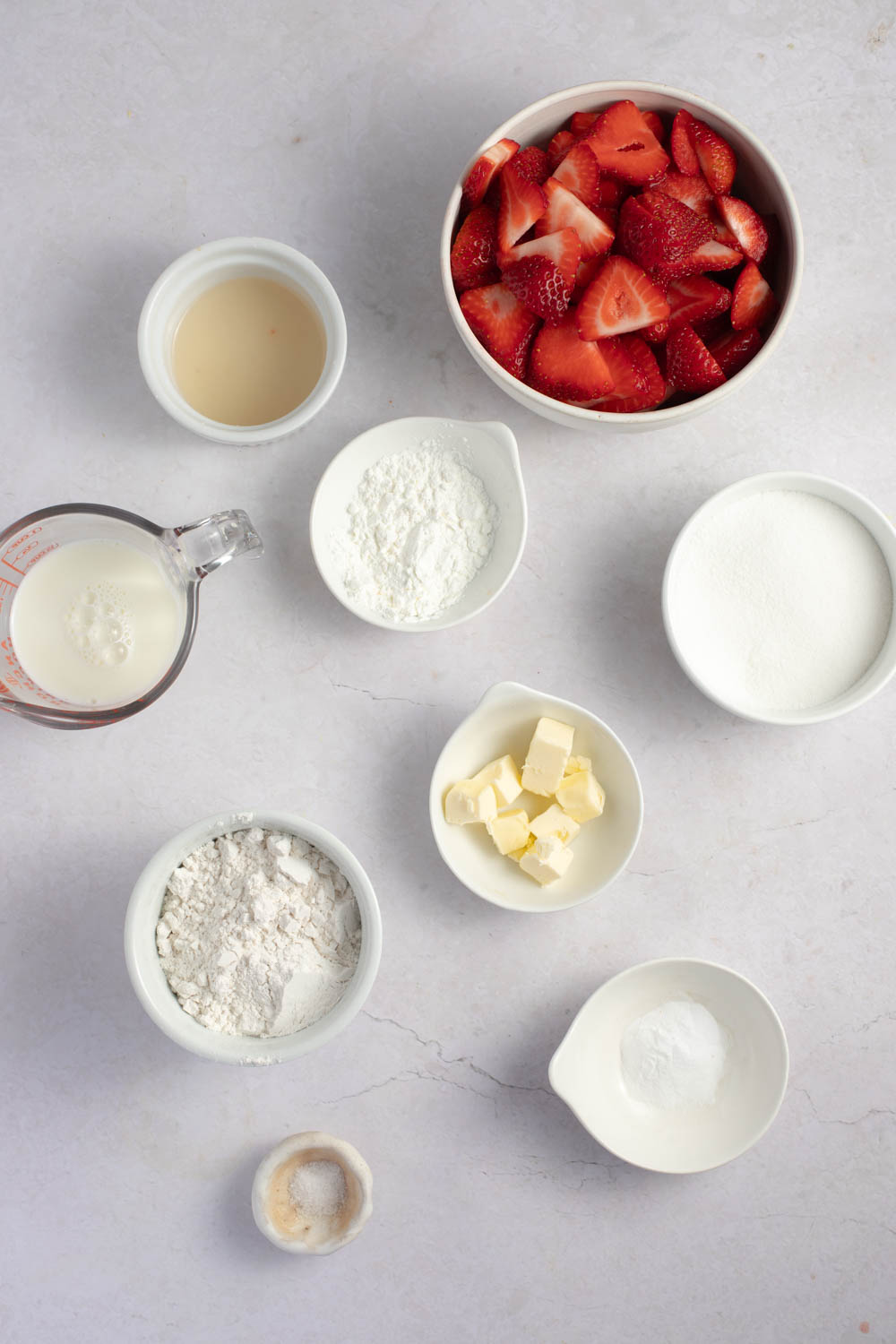 Strawberry Cobbler Ingredients - Sugar, Cornstarch, Lemon Juice, Strawberries, Butter, Flour, Baking Powder, Salt and Milk