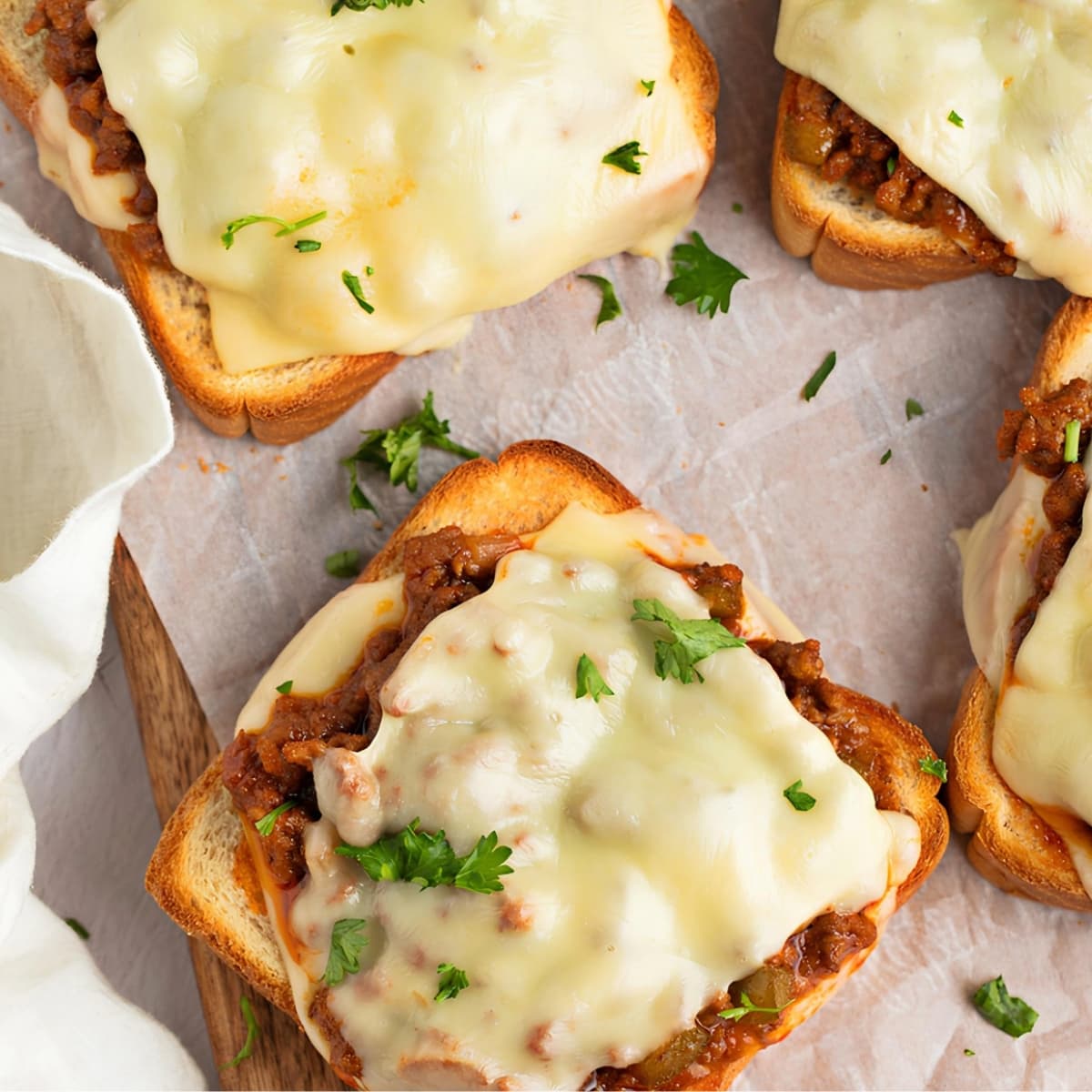 Toasted Sandwich with Ground Beef and Cheesy Sauce