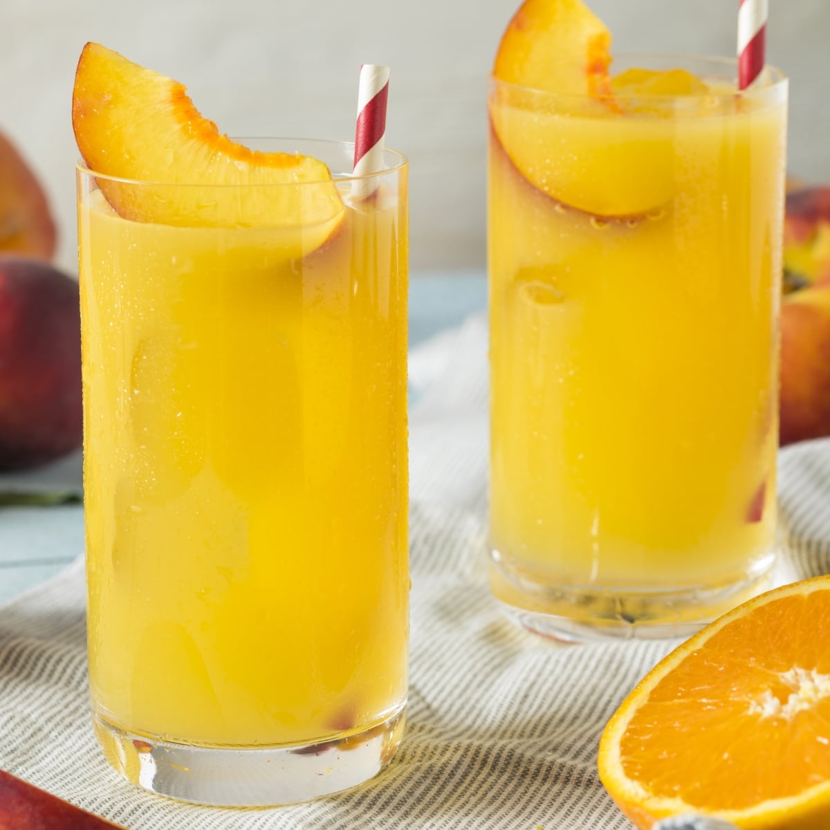 Two Glasses of Cold and Refreshing Fuzzy Navel Cocktail