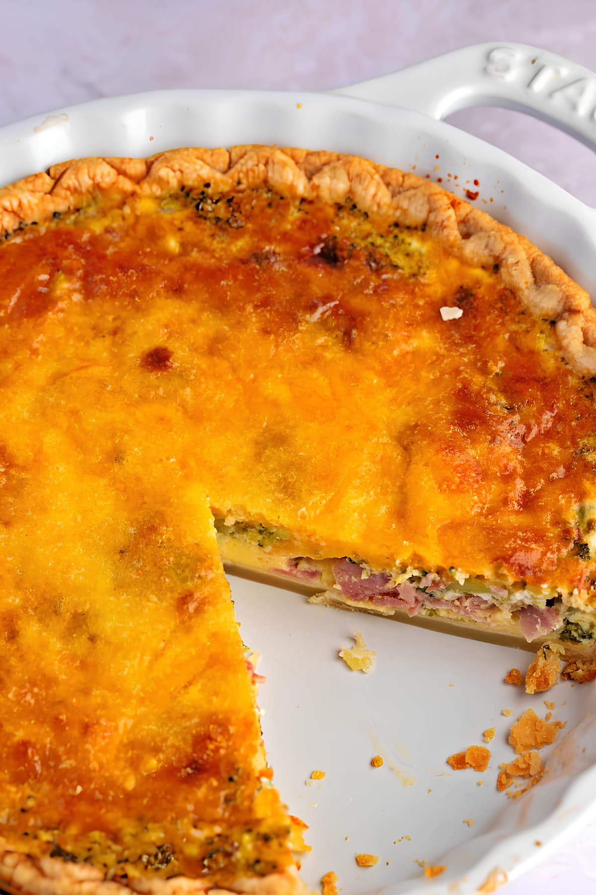 Warm Homemade Broccoli Cheddar Quiche with Ham and Vegetables