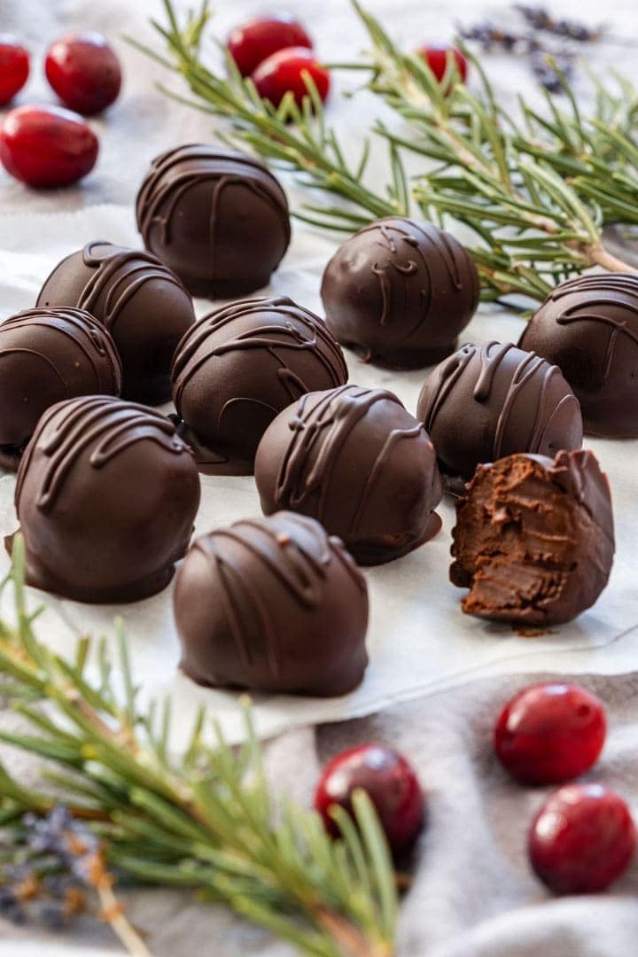 2 Ingredient Dark Chocolate Truffles with rosemary and cranberries on the side