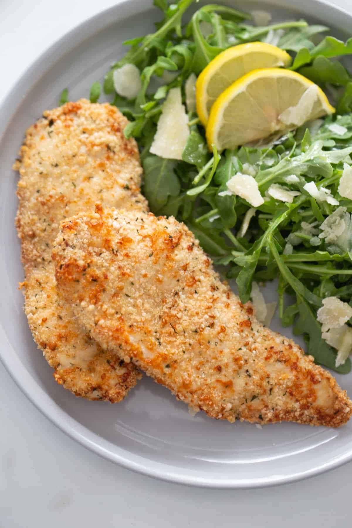 Air Fryer Chicken Cutlets with Vegetables and Lemon