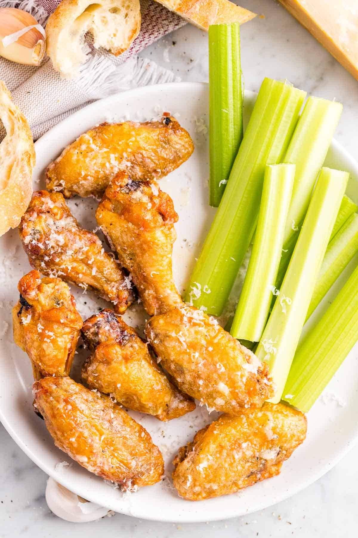 Air Fryer Chicken Wings with celery stalks on the side
