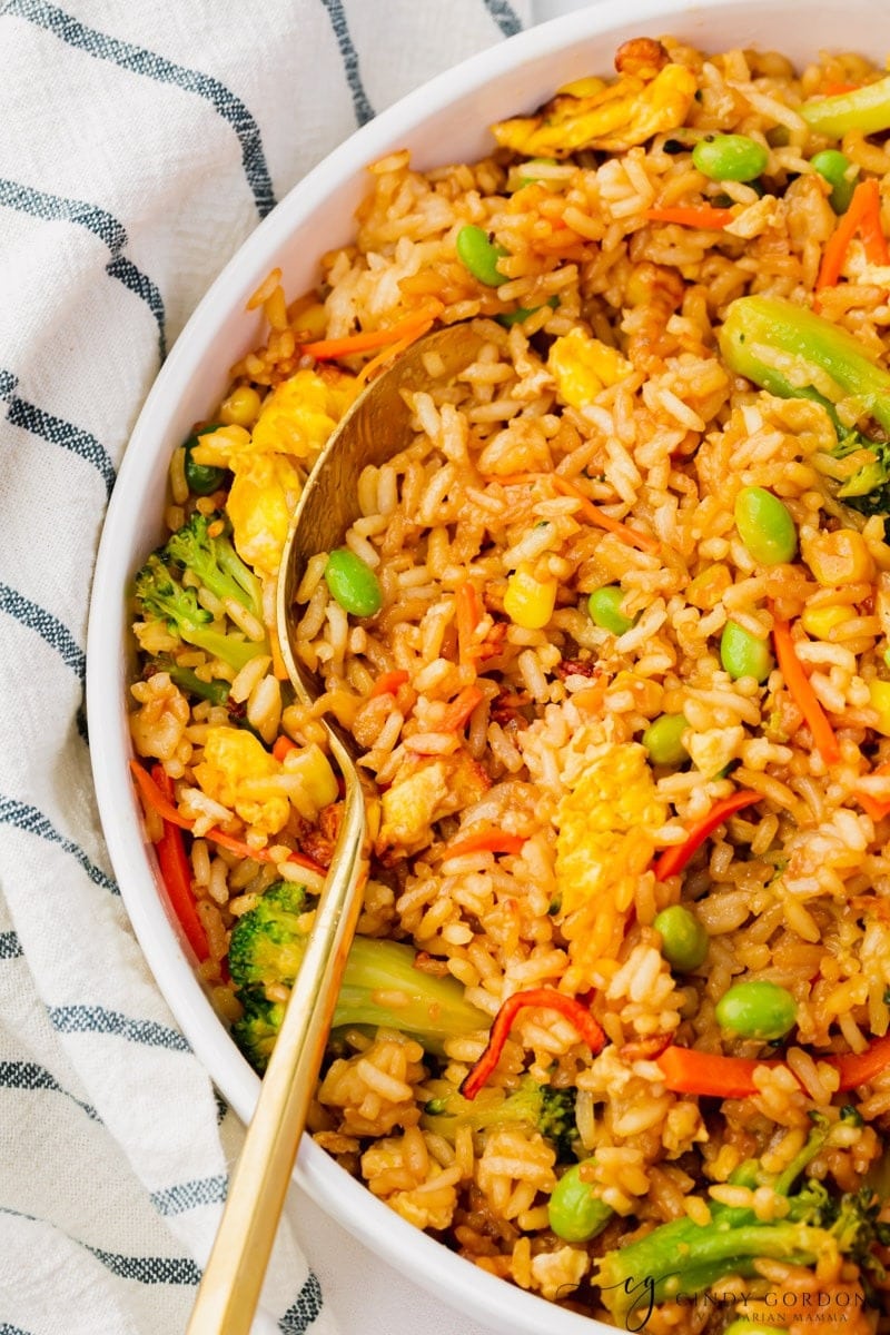 Bowl of Air Fryer Fried Rice with frozen vegetables used carrot, corn, broccoli and edamame