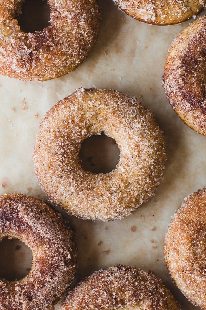 Apple cider donuts coated with sugar.