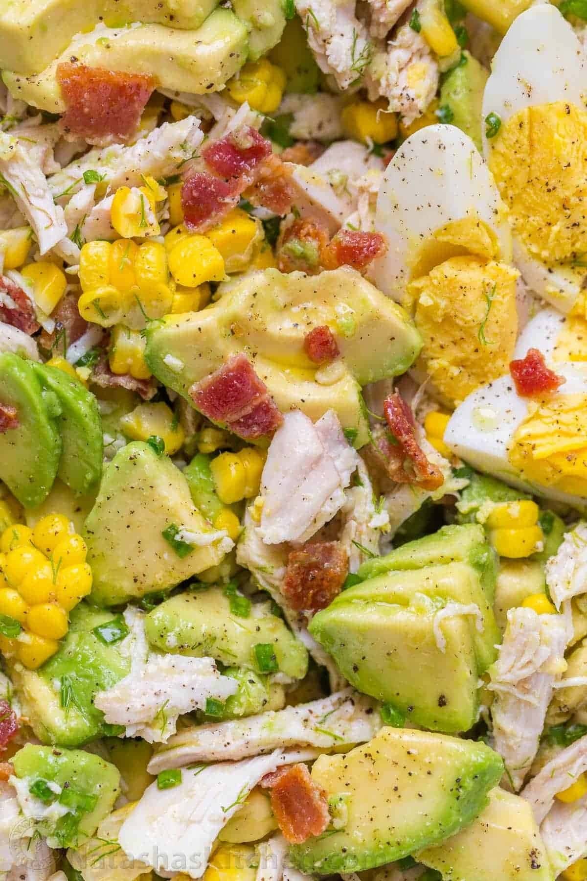 Avocado Chicken Salad with bacon, egg, corn, chives and dill