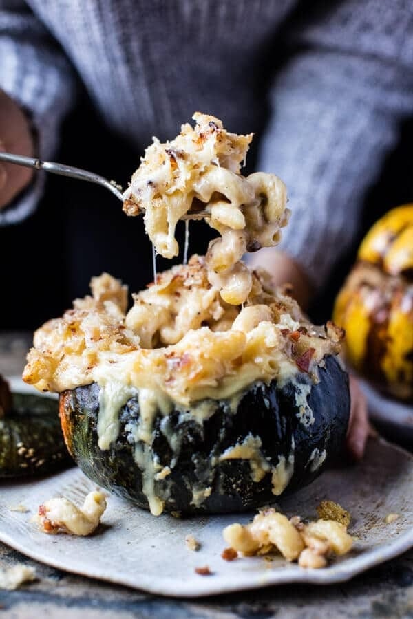 Baked acorn squash mac and cheese served on a plate. 