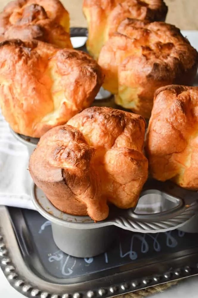 Popovers bread on  a molding tray.