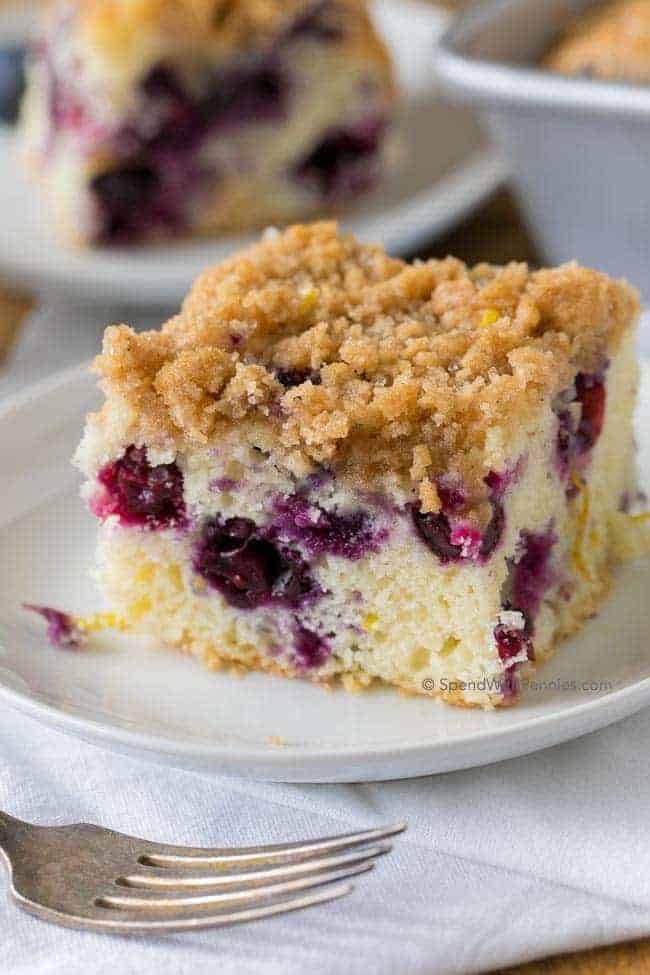 A slice of blueberry lemon coffee cake in a plate. 