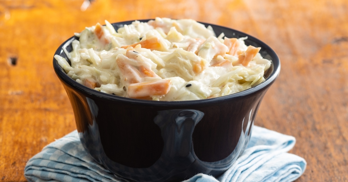 Creamy Homemade Coleslaw in a Black Bowl