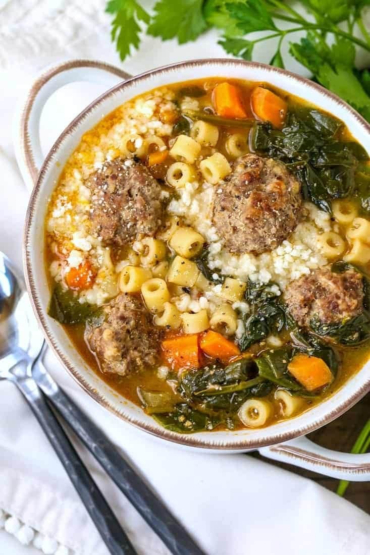 Bowl of Italian Wedding Soup with ground pork and beef meatballs and ditalini pasta