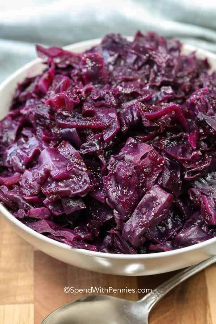 Braised red cabbage in a white bowl. 