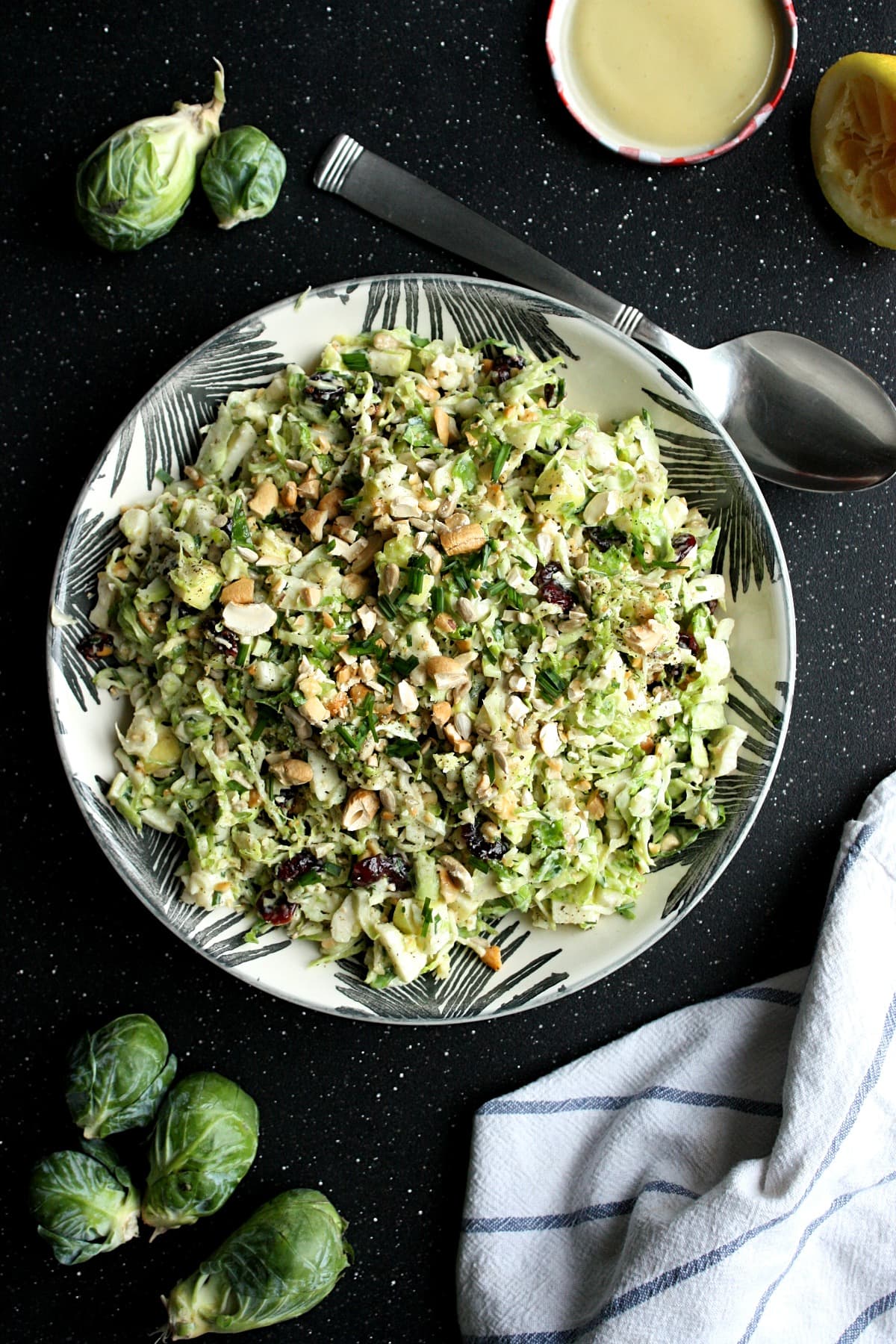 Brussels Sprout Slaw with Cranberries, Cashews, and Apples