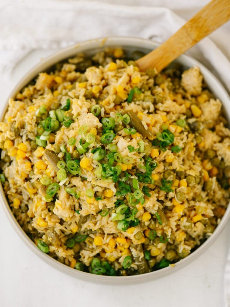 Bowl of Chicken Fried Rice with corn, green peas, and green onions