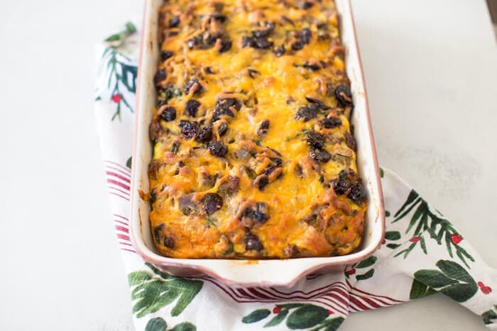 Breakfast strata with cheese, sausage and cherries. 
