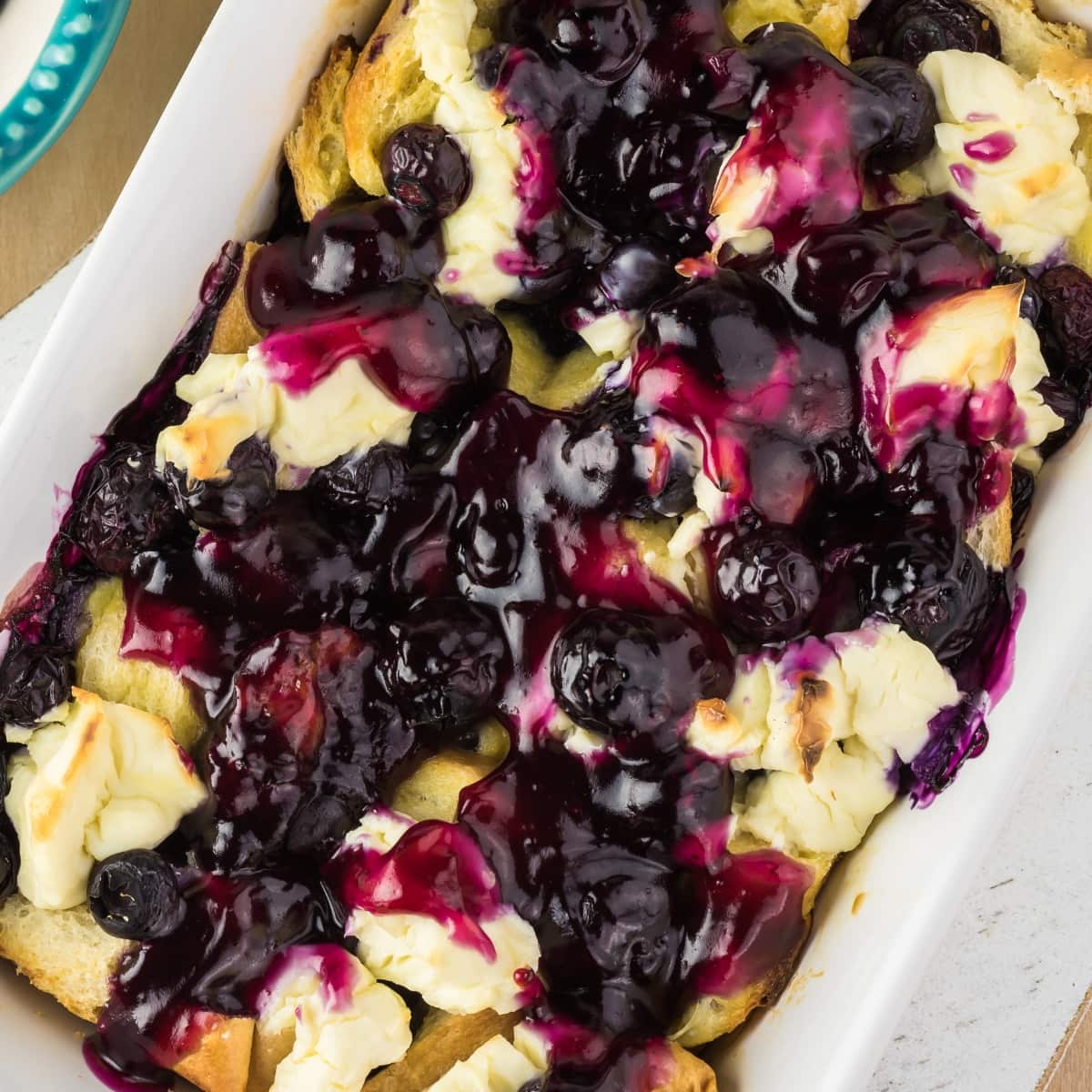 Blueberry French toast in a casserole dish closeup. 