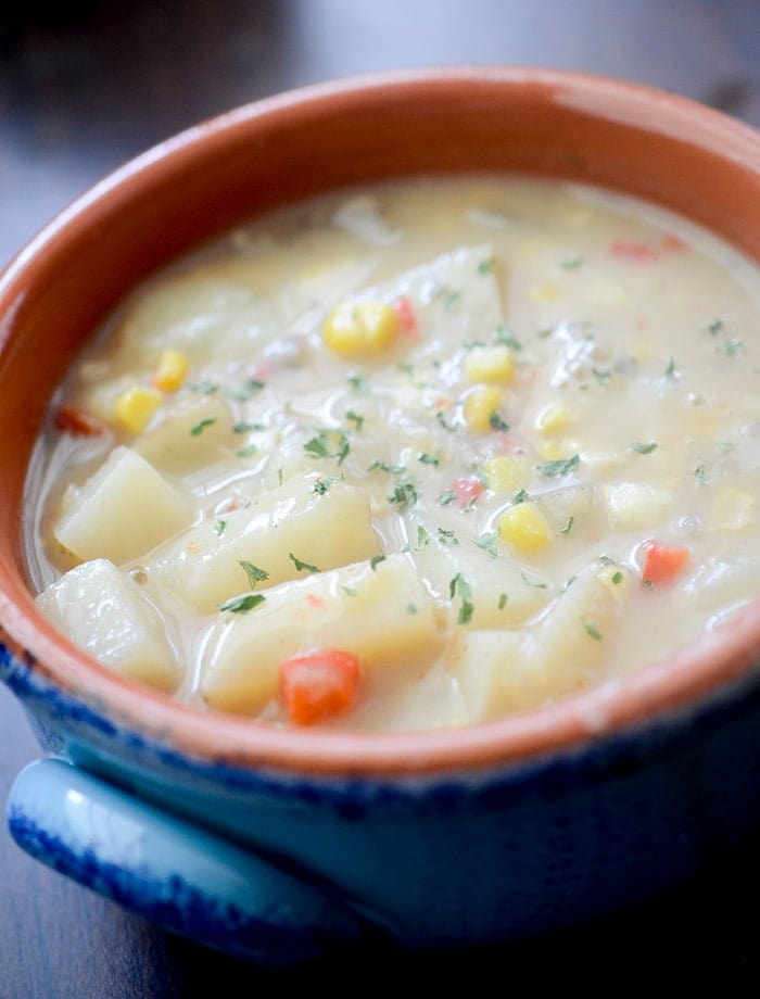 Creamy Corn Chowder with Potatoes and Carrots in a Bowl
