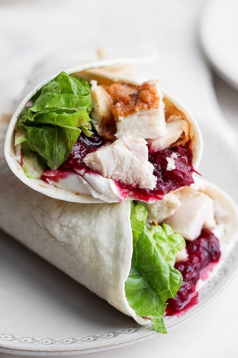 Wrap filled with turkey, lettuce and sweet cranberry sauce.